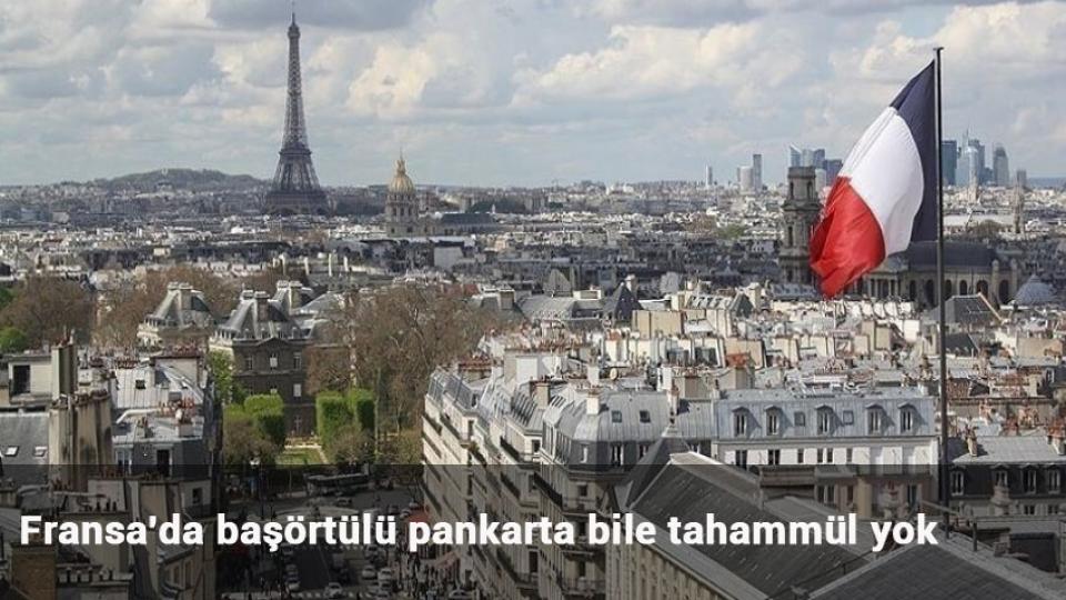 Fransa'da başörtülü pankarta bile tahammül yok